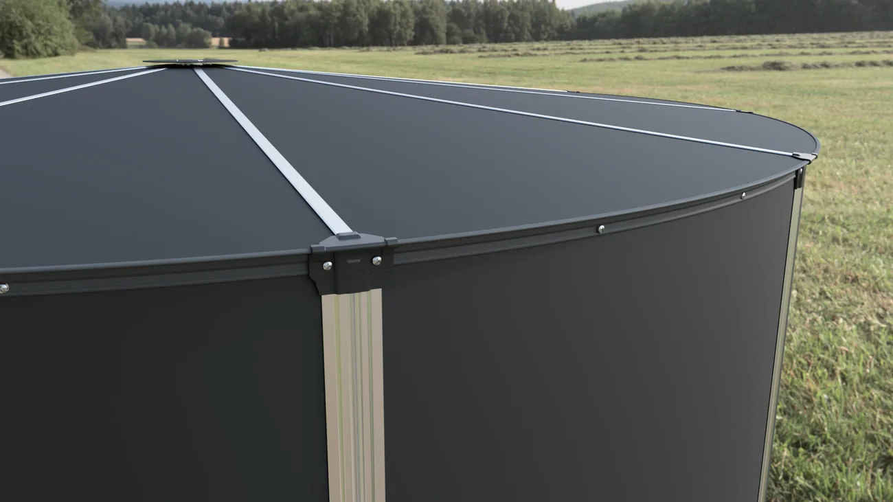 Curved raw aluminium roof rim and colour-matched joint on a MyTankCo tank
